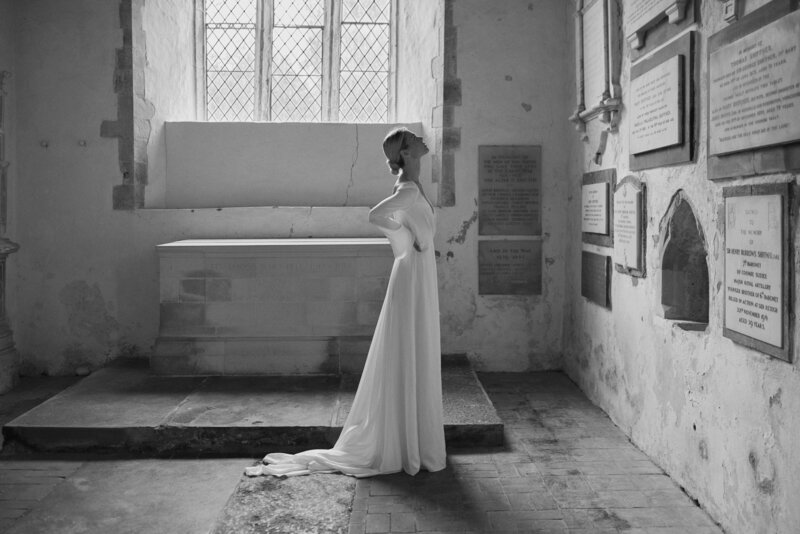 Benjamin Wheeler photography of bride wearing long, elegant deep v-neck silk wedding dress