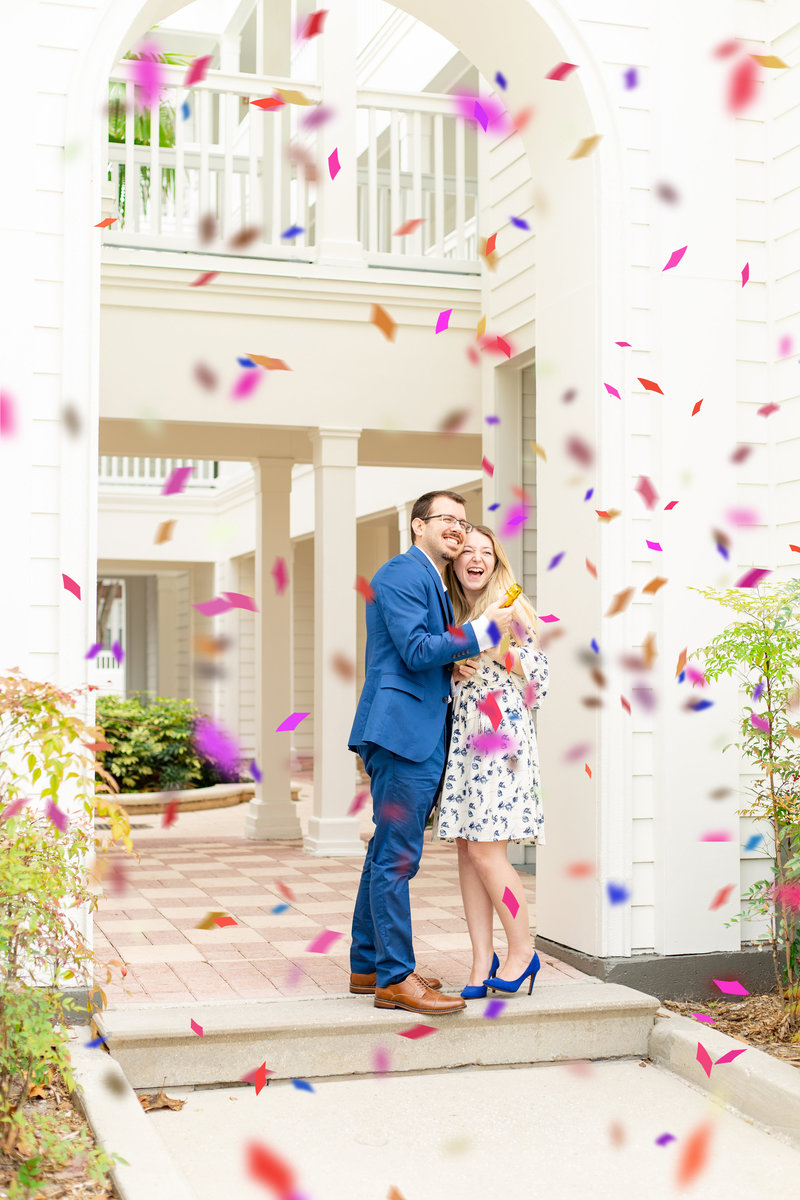 Tampa Wedding photographers pop confetti in portrait