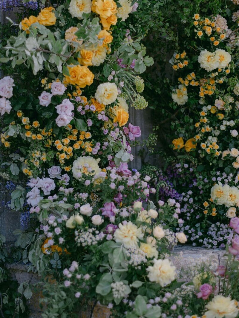 Lilac and yellow luxury floral arch