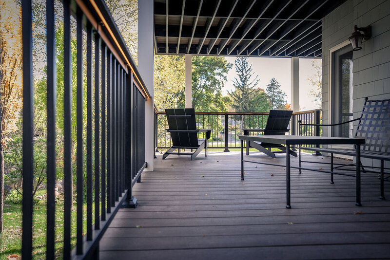 Private lower deck made with TimberTech Advanced PVC and Owens Corning composite framing. 