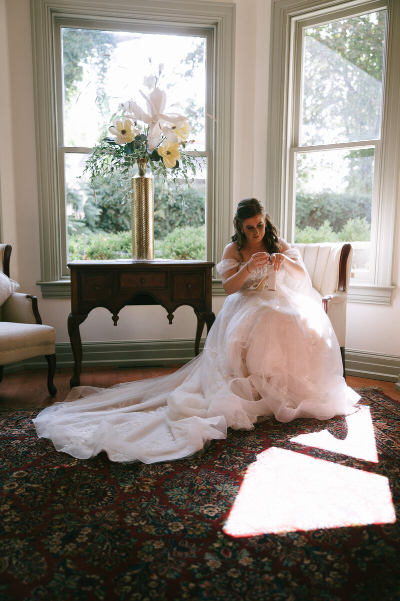 Editorial image of a bride getting ready at Stone Mansion in PA
