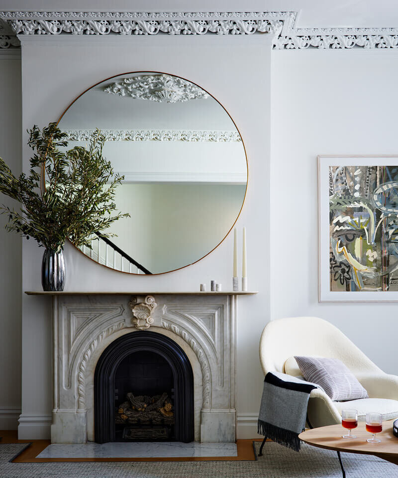 Boston interior designer focused on timeless spaces in New England homes, blending classic architecture with modern furnishings for refined living.
