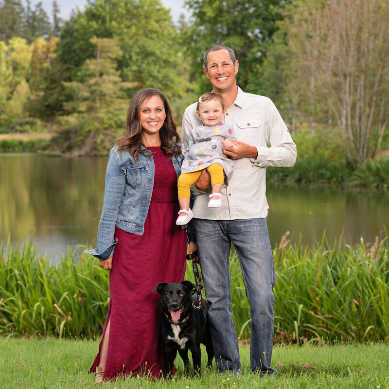 Family with dog and baby