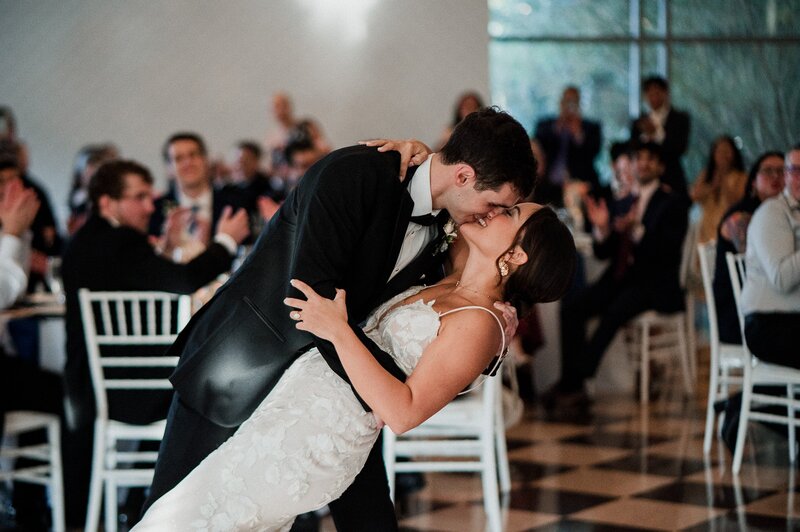 Bride and groom kissing at their wedding
