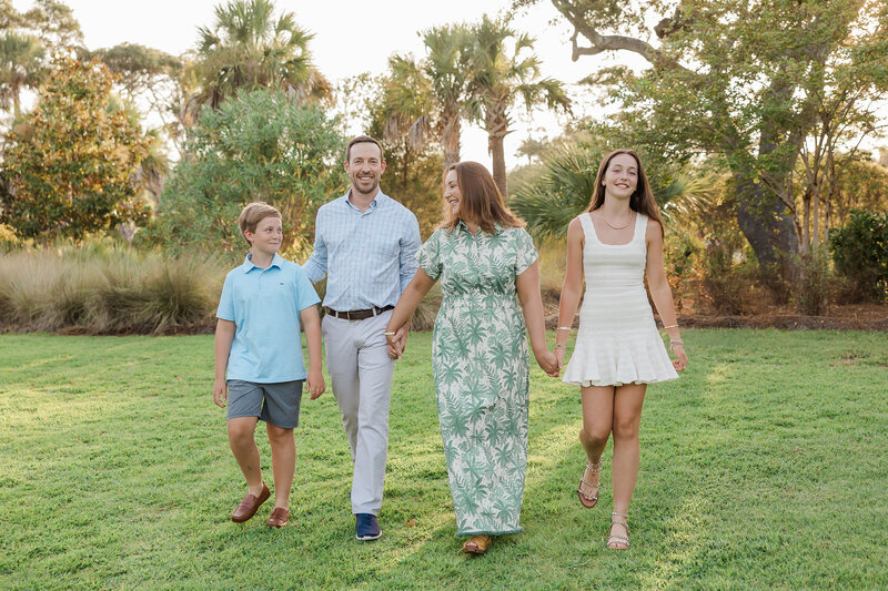 Three generations photographed at Edisto Island South Carolina in natural light.  They are wearing casual clothing and near beach photography