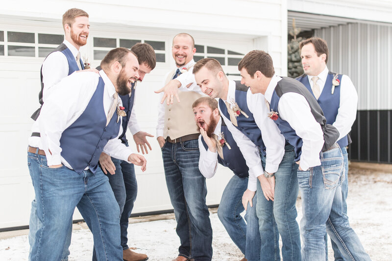 Groomsmen admiring ring