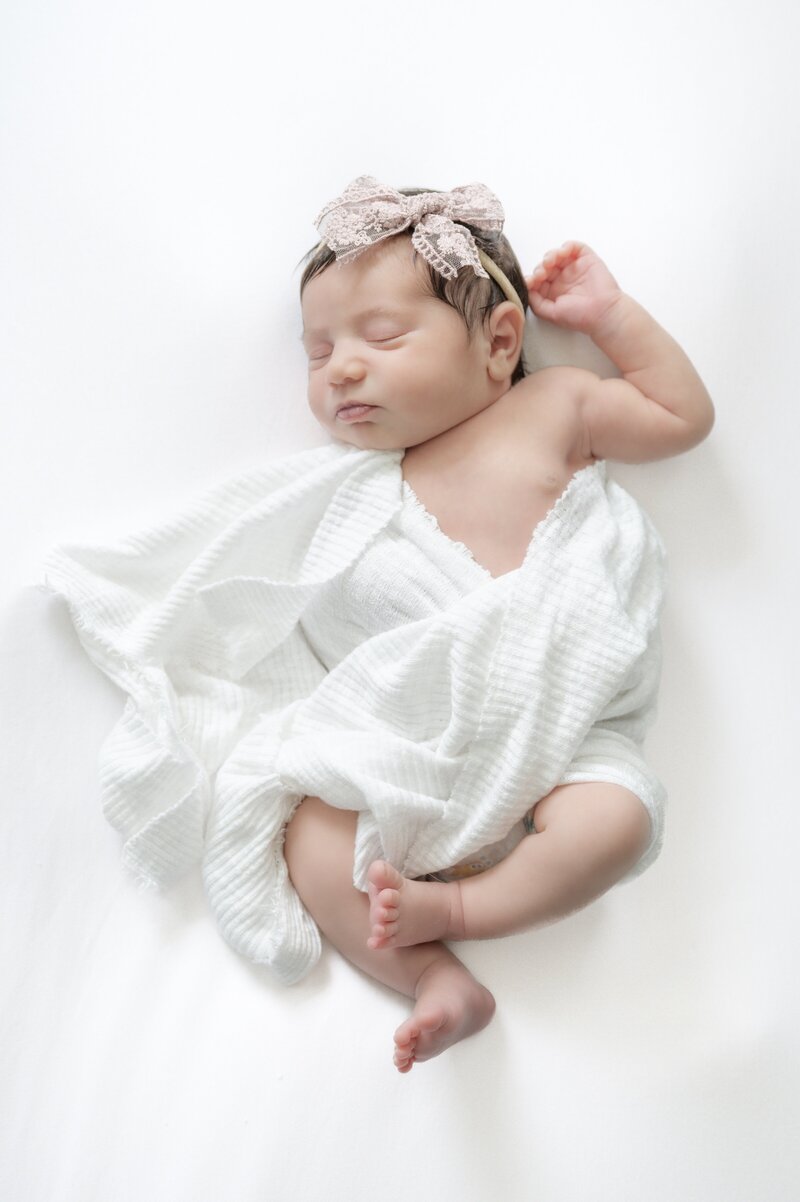 Newborn baby sleeping taken by Apex Newborn Photographer