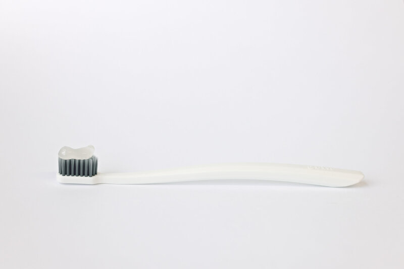 toothpaste on a toothbrush