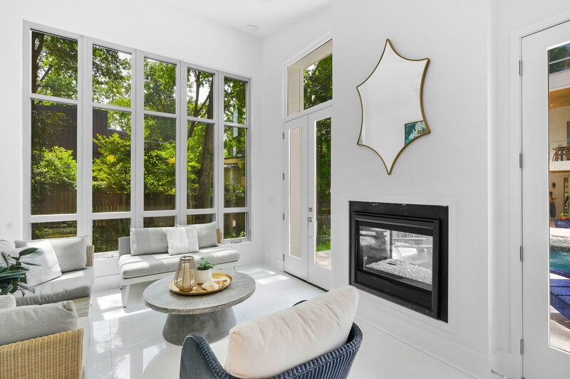 double sided fireplace in a pool house design