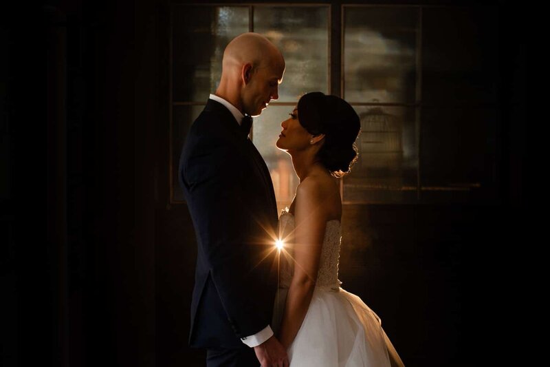This romantic photograph captures the bride and groom gazing at each other inside the elegant setting of Hudson, The Guild, and Sub Rosa, creating a memorable wedding moment.