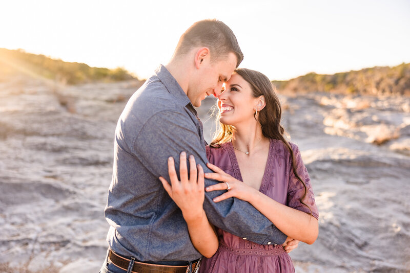 Couple Engagement photo taken in Pedernales Falls State Park in Johnson City, Illinois.