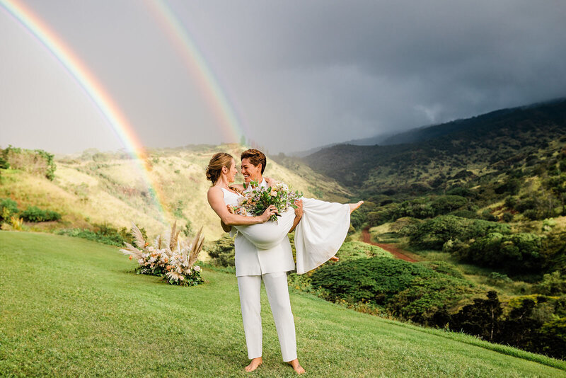 bride and groom hugging after elopement ceremony at the beach in california