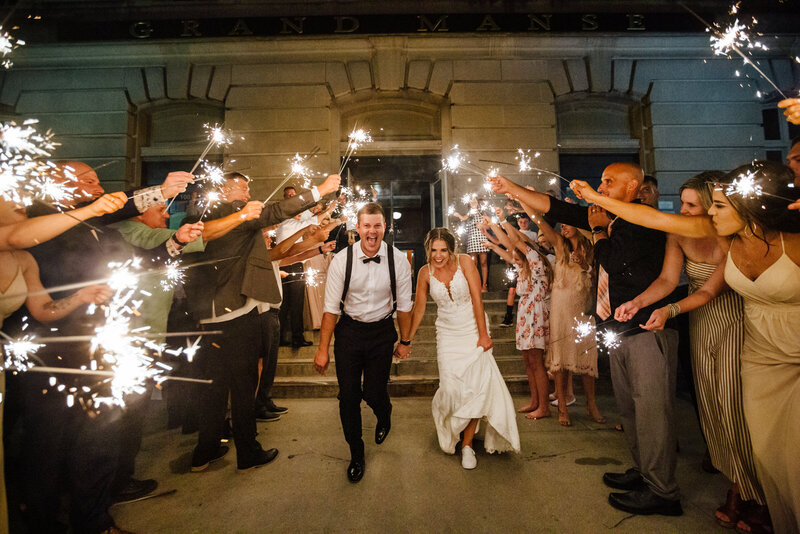 Bride and Groom Exiting Church with Fireworks