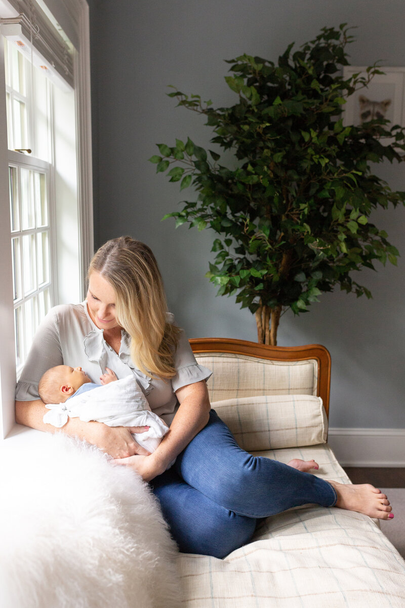 Mom with baby in nursery - Lifestyle Newborn Session - Naperville Photographer Jen Madigan