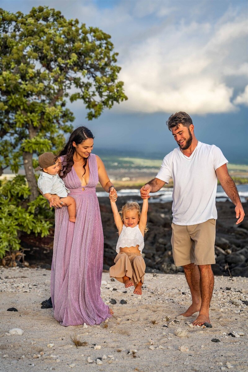 family portrait on beach by Big Island family photographer