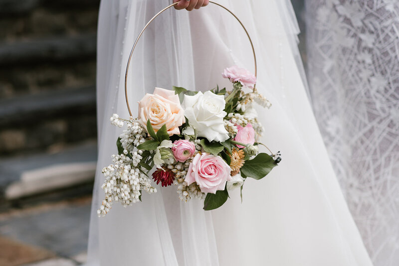 Floral hoop with pink and white and peach flowers wedding bouquet
