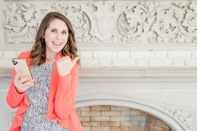 Cait Potter in a coral blazer smiling