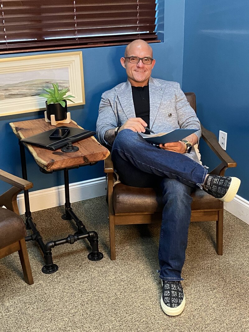 Clint-Garza-henley-grey-sportcoat-sitting