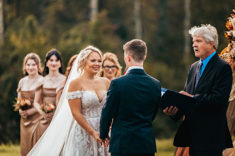 Bride and grooms first kiss during ceremony at Pembroke Pines Country Club by NH wedding Photographer Lisa Smith Photography