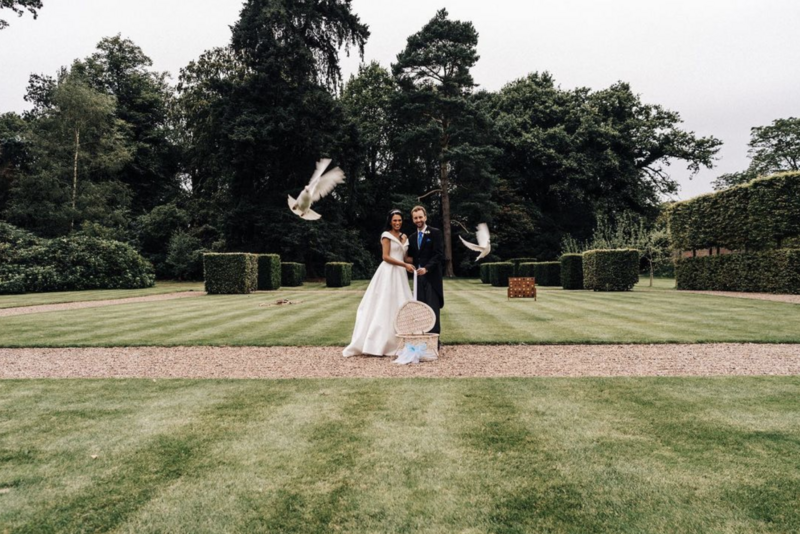 Wedding couple with doves