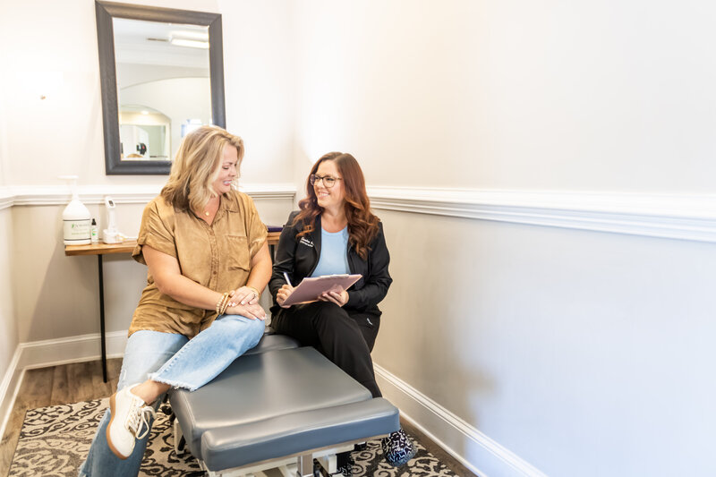 Dr. Buffkin and patient talking about their appointment