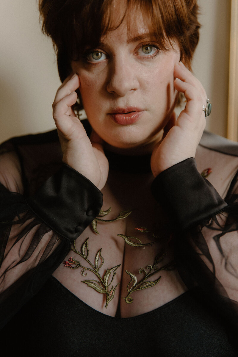 moody, playful branding session headshot of photographer Annie Minicuci