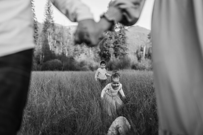 family playing in the fields of montana