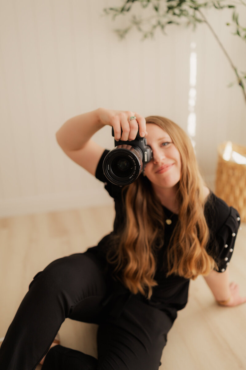 Utah Wedding Photographer Robin Kunzler smiles for a self portrait branding photo