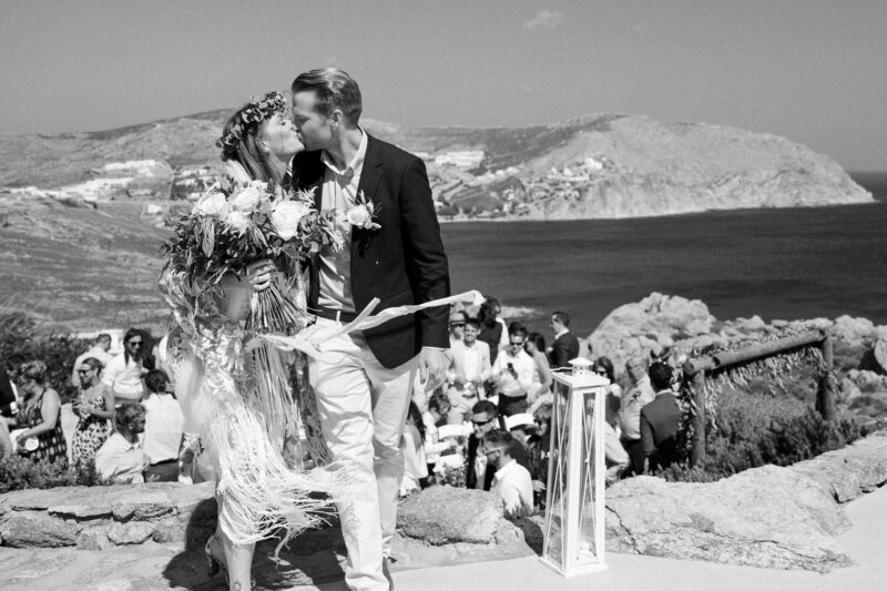 Bride & Groom kiss after getting married in Mykonos