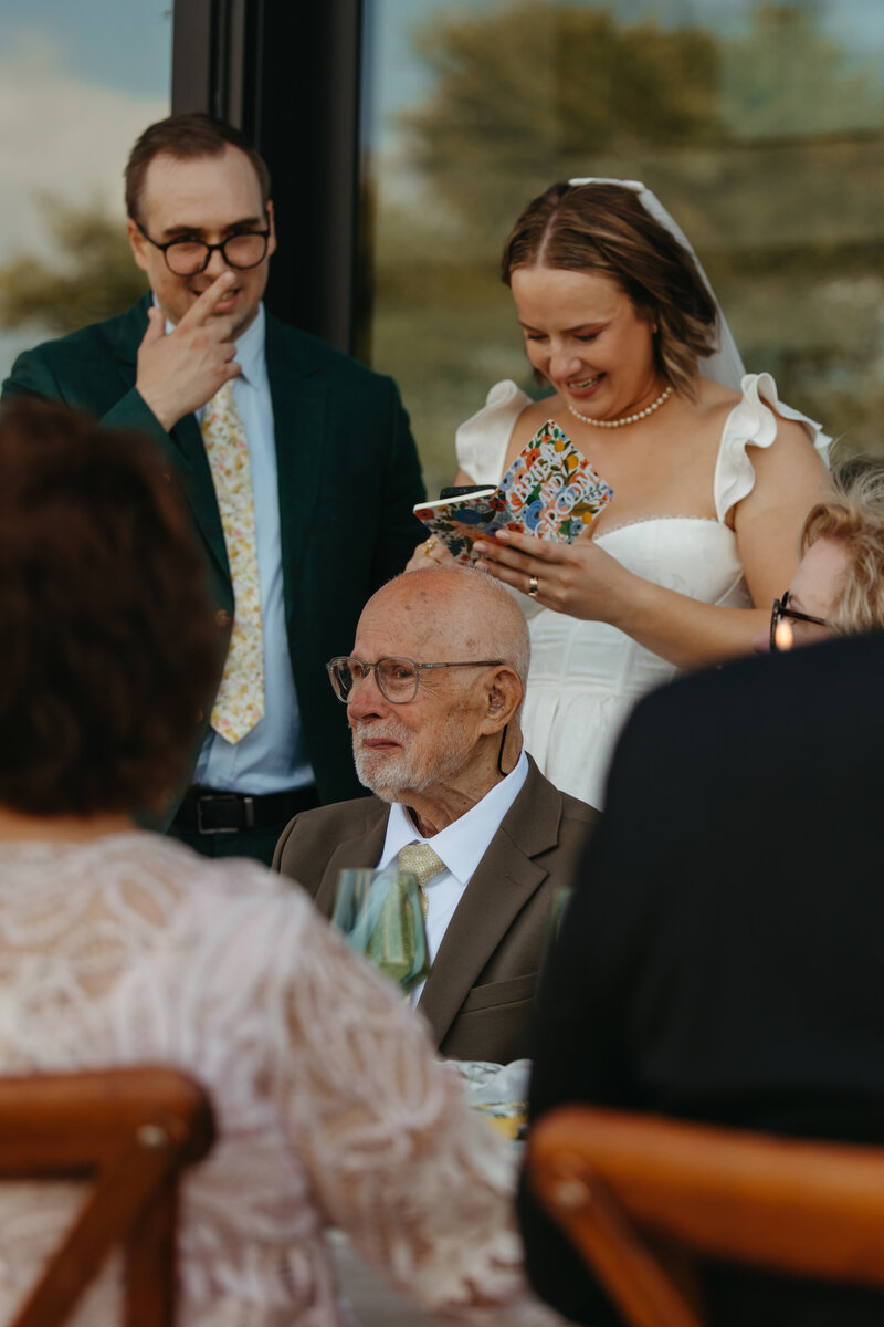bride sees best friend as she walks down the aisle with her dad