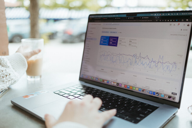 Pulling up Search Console Analytics in Google at a Coffee shop with the Comma Mama Co.