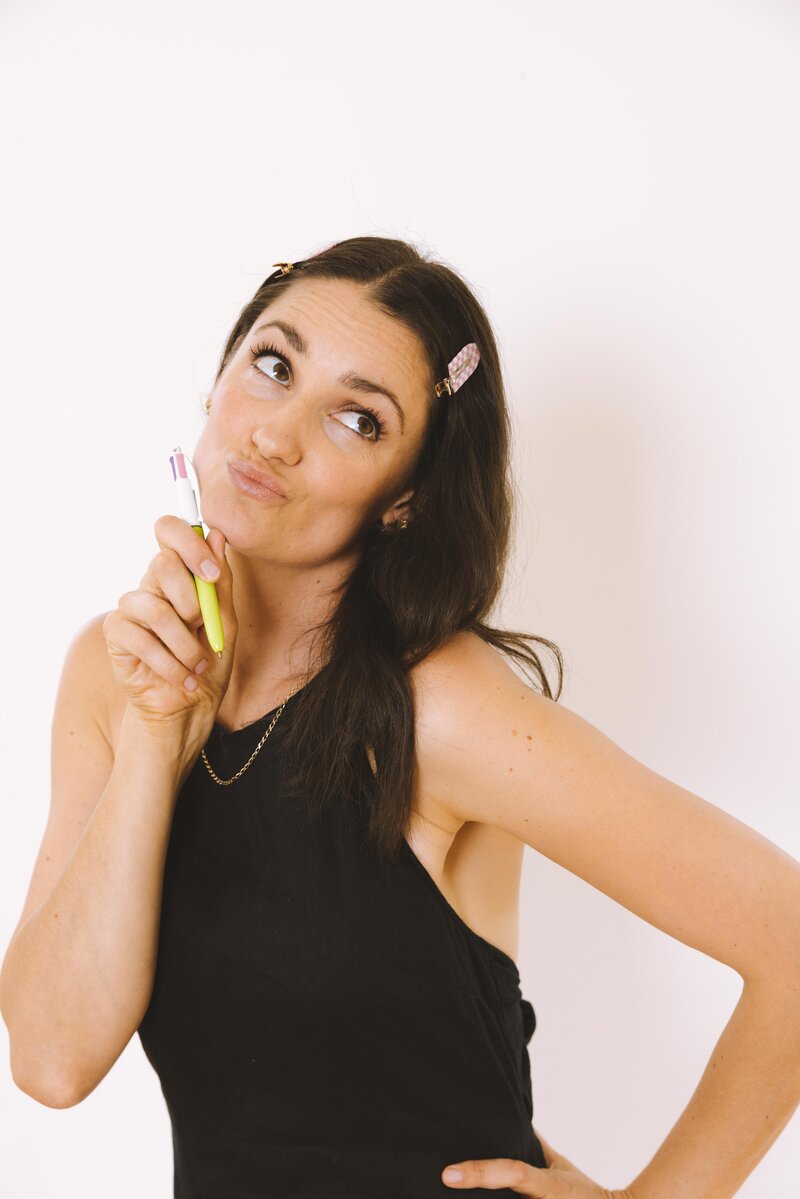 marisa twentyman copywriter with pen creating website copy template