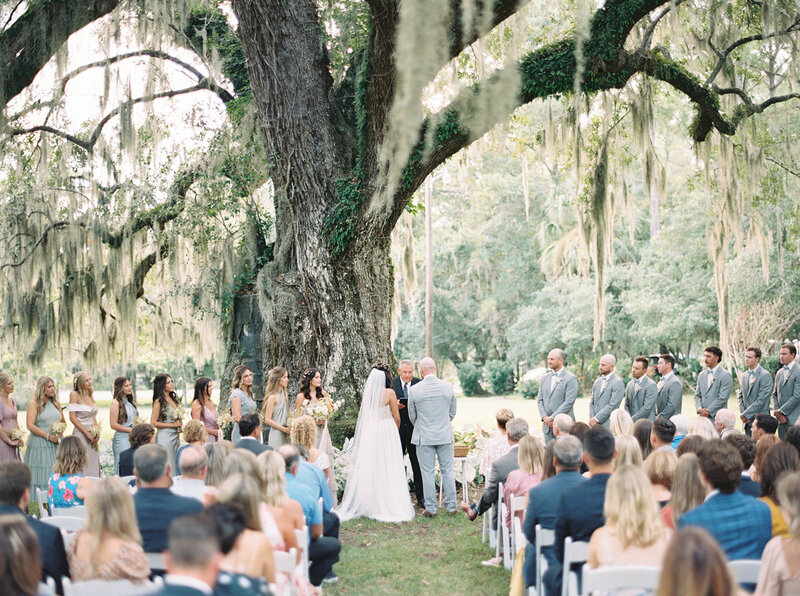 Landscape image of outdoor wedding reception space