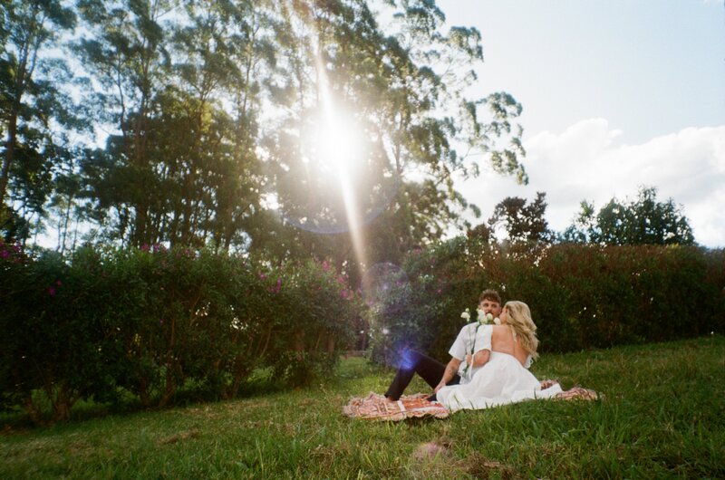 A newly engaged couple photographed on film in Maleny Brisbane on an engagement photo shoot