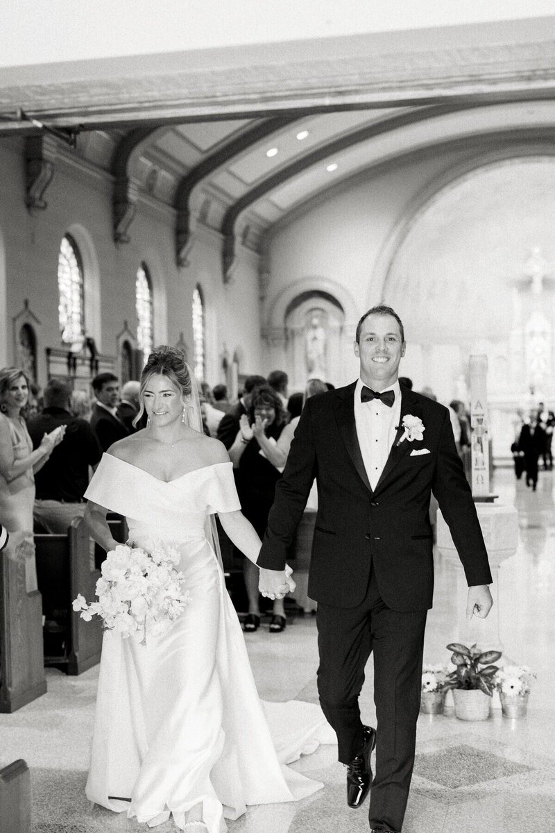 Close-up of a smiling newly married couple, expertly photographed by a Emily Barbara Milwaukee wedding photographer.