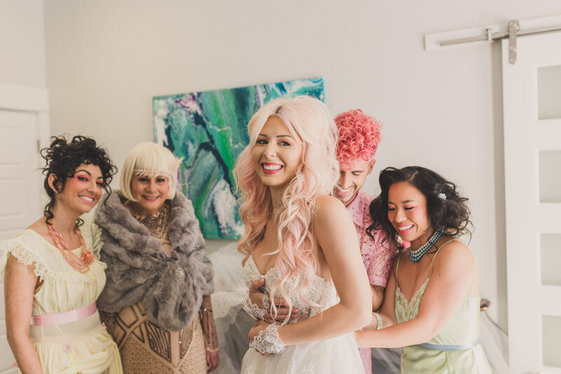 bride annalee belle getting ready with bridal party before celebrity wedding at lotus house in las vegas