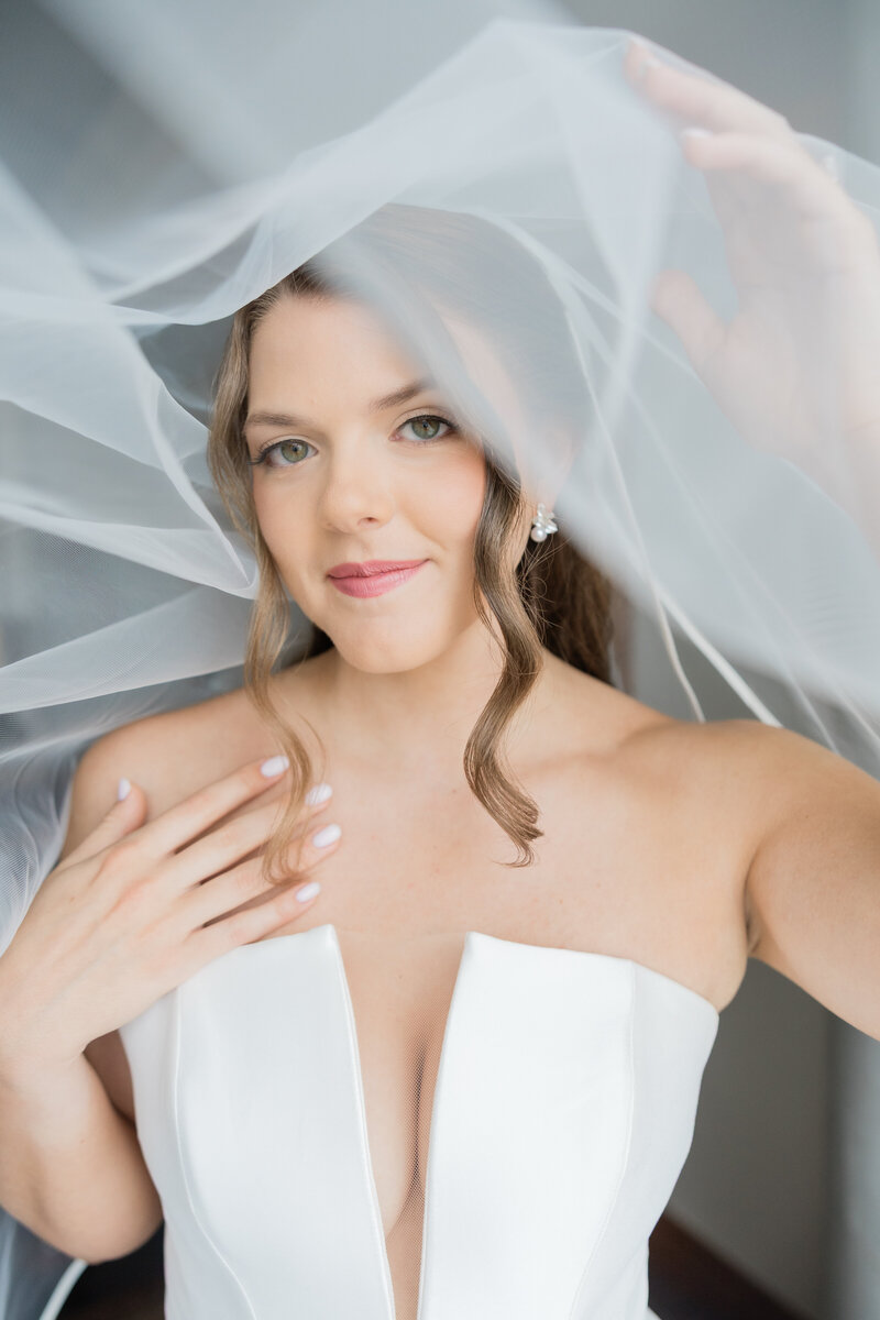 A portrait of a bride under a veil at the Ben in West Palm Beach.