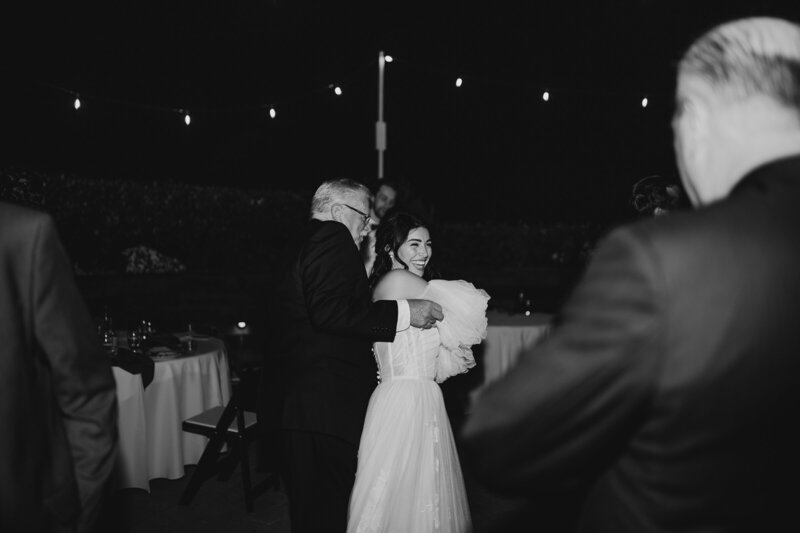 grandfather and granddaughter dance
