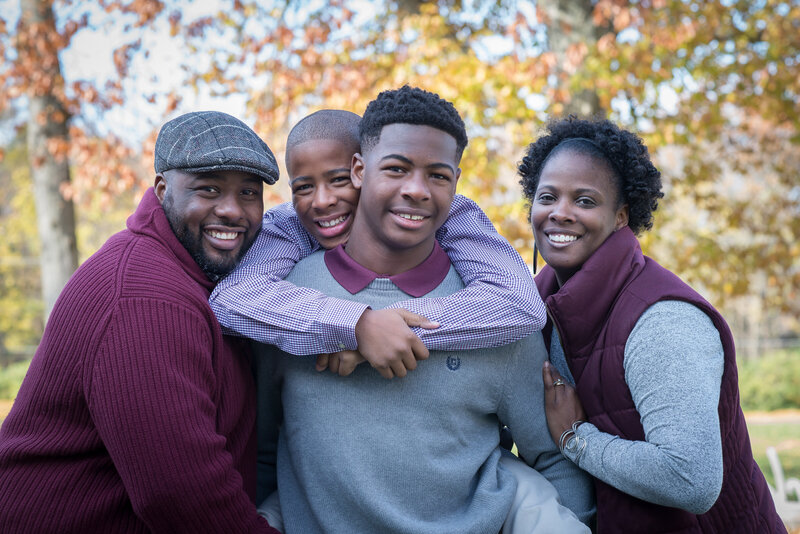 Coulby Park fall family photos wearing burgundy and gray clothes