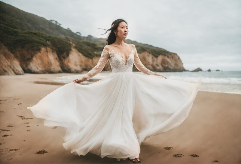 Captivating image capturing the magical moment when a bride and groom share a kiss in the aisle, set against the stunning backdrop of Half Moon Bay.