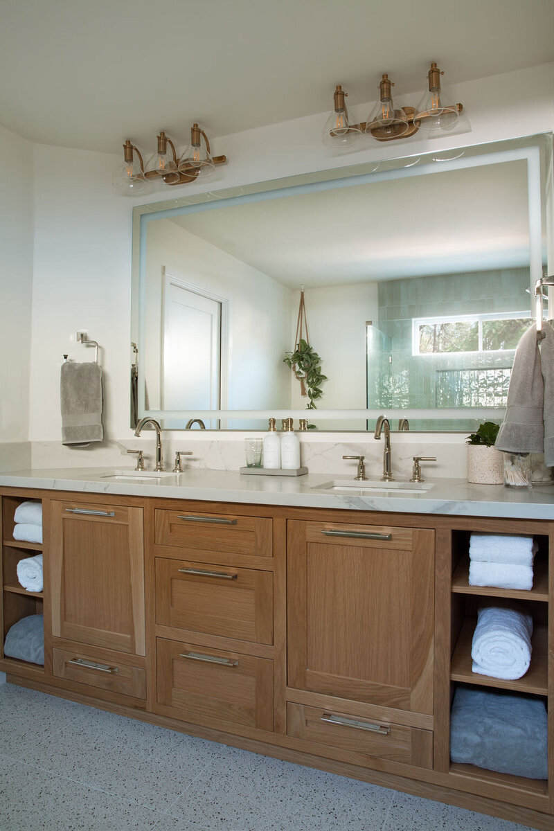 primary bathroom double sink with custom cabinetry