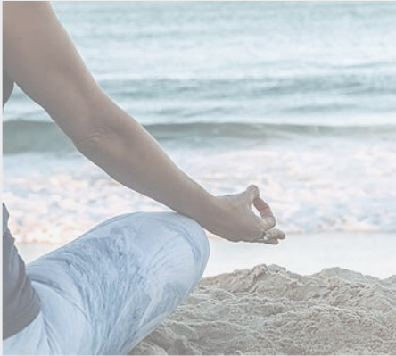 Relaxing meditation pose on the beach