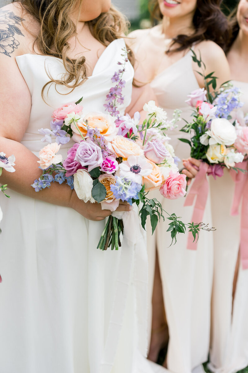 purple blue and peach wedding flowers