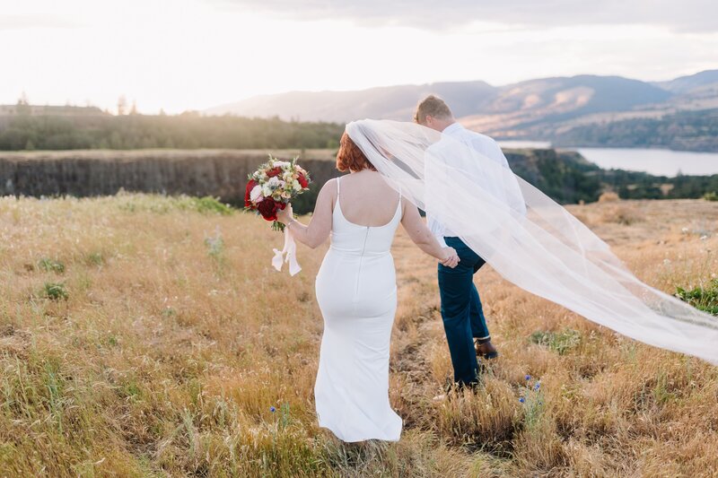 rowena crest elopement windy with veil in the wind