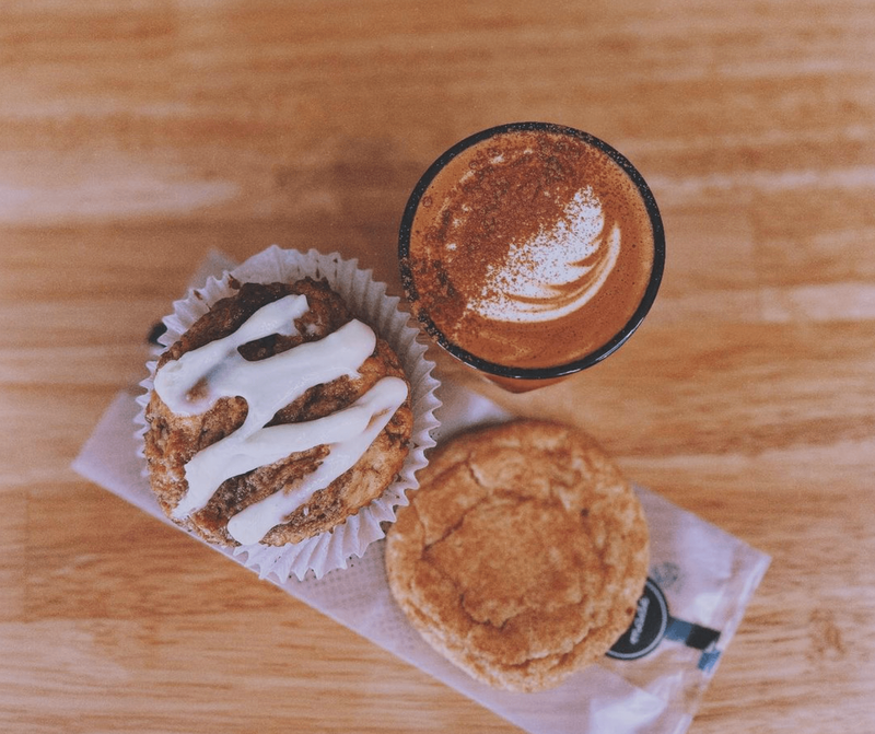 A cup of coffee and two pastries from Atrium Coffee in Temple Texas