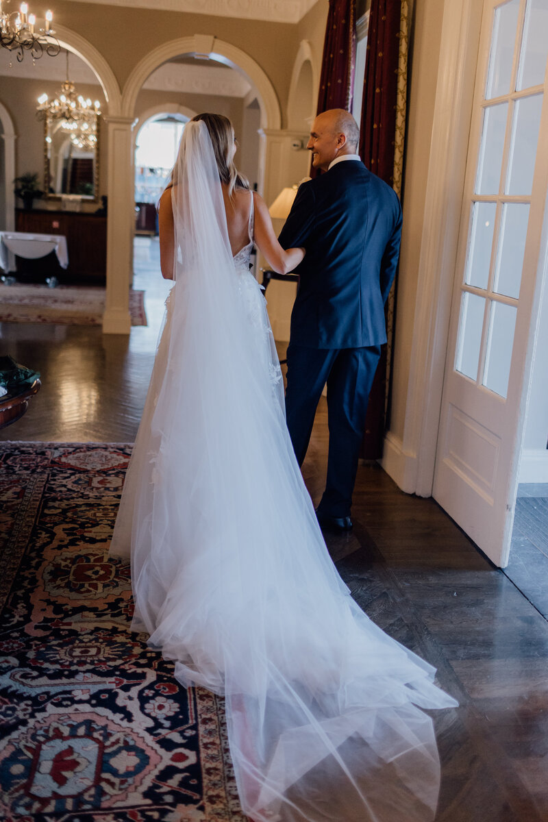 dad-and-bride-walking-toceremony-at-castlemartyr