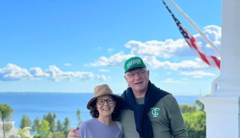 Founders of Ecosystems transfer and recycling, Janet and Buck of Veneta, smile at the camera.