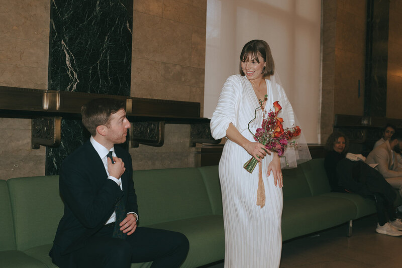 bride and groom posing at city hall before eloping shot by Elsie Goodman Photography | NYC Elopement Packages
