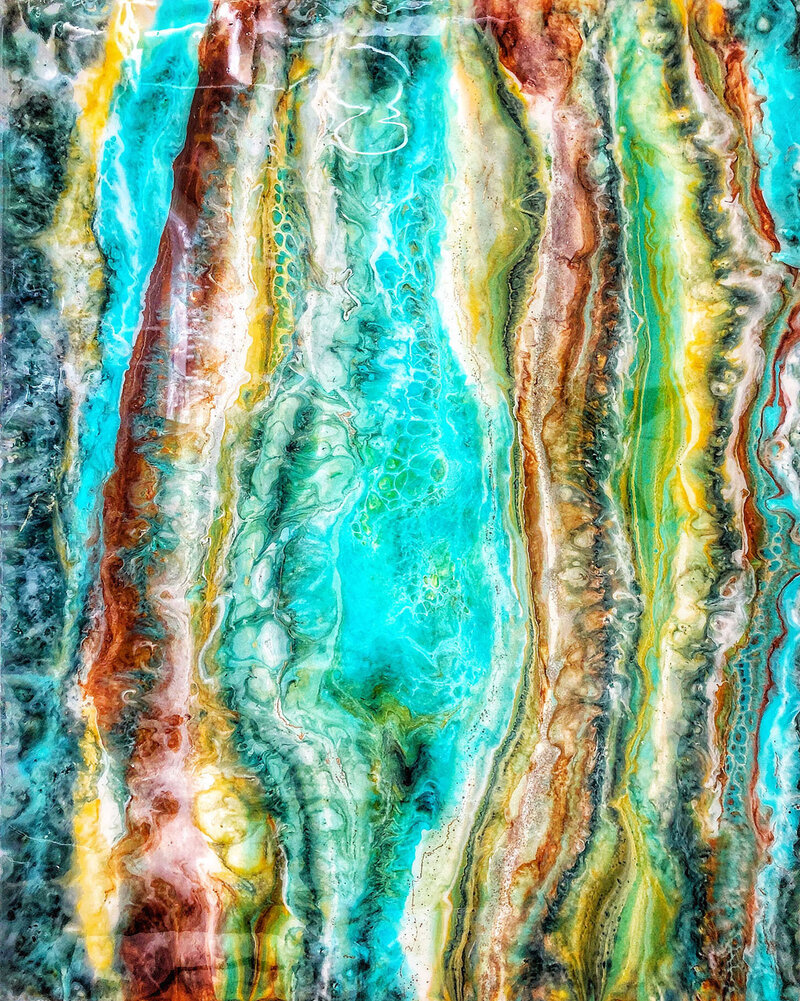 Collection of fluid art pieces featuring marbled textures and rich, swirling colors inspired by natural elements