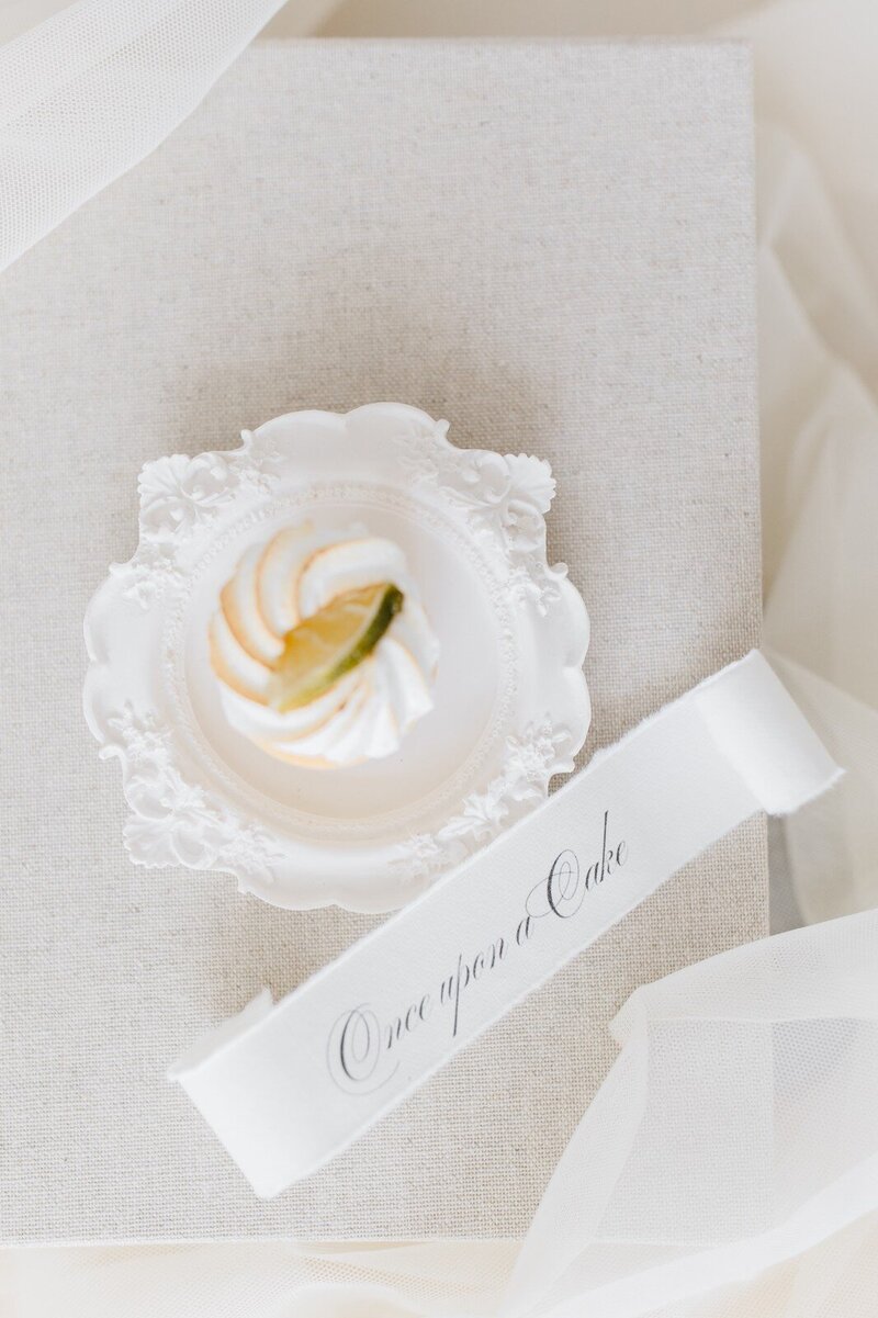 Bespoke luxury sweet table cake at palace in sunny Tuscany Italy, executed by ÈCLAT Destination Weddings